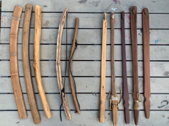 Neal Stilley's rabbit stick, friction fire bows, atlatl collection